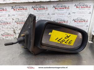Używane Lusterko zewnetrzne prawe Mazda 323 Fastbreak (BJ14) 1.6 16V Cena na żądanie oferowane przez Autodemontage M.J. Rutte B.V.