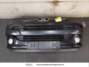 Used Front bumper Peugeot 1007 (KM) 1.6 GTI,Gentry 16V Price on request offered by Autodemontage M.J. Rutte B.V.
