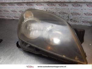 Used Headlight, right Opel Astra H SW (L35) 1.6 16V Twinport Price € 50,00 Margin scheme offered by Autodemontage M.J. Rutte B.V.