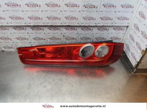 Used Taillight, left Ford Fiesta 5 (JD/JH) 1.3 Price on request offered by Autodemontage M.J. Rutte B.V.