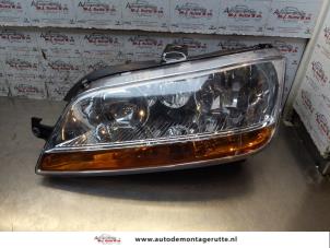 Used Headlight, left Fiat Idea (350AX) 1.4 16V Price on request offered by Autodemontage M.J. Rutte B.V.