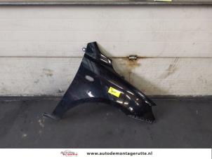 Used Front wing, right Mazda 2 (NB/NC/ND/NE) 1.4 16V Price on request offered by Autodemontage M.J. Rutte B.V.