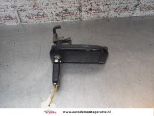 Used Door handle 2-door, right Volkswagen Transporter/Caravelle T4 1.9 TDI Price on request offered by Autodemontage M.J. Rutte B.V.