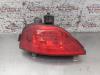 Rear fog light from a Renault Megane III Coupe (DZ) 1.4 16V TCe 130 2010