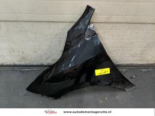 Used Front wing, left Renault Megane III Coupe (DZ) 1.4 16V TCe 130 Price on request offered by Autodemontage M.J. Rutte B.V.