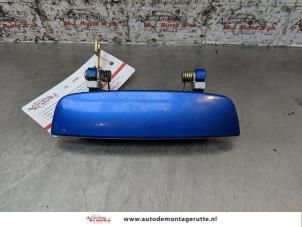 Used Tailgate handle Subaru Impreza II Plus (GG) 1.6 16V TS 4x4 Price on request offered by Autodemontage M.J. Rutte B.V.