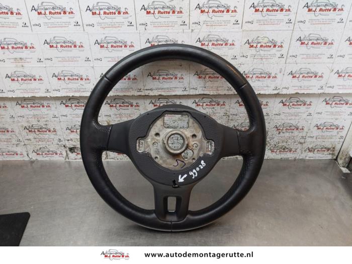 Steering wheel from a Volkswagen Polo V (6R) 1.2 TDI 12V BlueMotion 2011