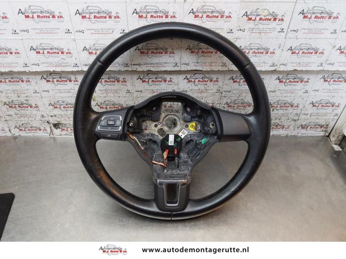 Steering wheel from a Volkswagen Polo V (6R) 1.2 TDI 12V BlueMotion 2011