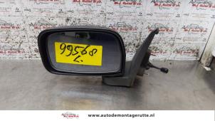 Used Wing mirror, left Toyota Starlet (EP9) 1.3,XLi,GLi 16V Price on request offered by Autodemontage M.J. Rutte B.V.