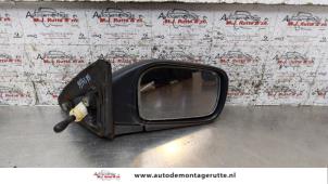 Used Wing mirror, right Nissan Sunny (N14) 1.4i 16V Price on request offered by Autodemontage M.J. Rutte B.V.