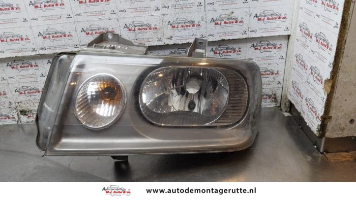 Headlight, left from a Peugeot Expert (222/224) 2.0 HDi 110 2005
