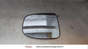 Used Mirror glass, left Daihatsu Cuore (L251/271/276) 1.0 12V DVVT Price on request offered by Autodemontage M.J. Rutte B.V.