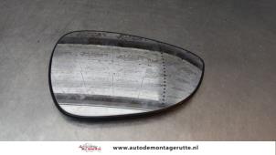 Used Mirror glass, right Ford Fiesta 6 (JA8) 1.25 16V Price on request offered by Autodemontage M.J. Rutte B.V.