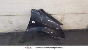 Used Front wing, right Toyota Corolla Verso (R10/11) 1.8 16V VVT-i Price on request offered by Autodemontage M.J. Rutte B.V.