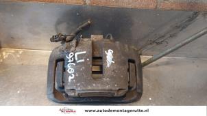 Used Front brake calliper, left Audi A8 (D3) 4.2 V8 40V Quattro Price on request offered by Autodemontage M.J. Rutte B.V.