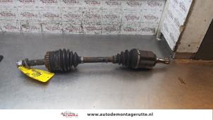 Used Front drive shaft, left Opel Corsa C (F08/68) 1.0 12V Twin Port Price on request offered by Autodemontage M.J. Rutte B.V.