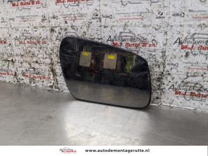 Used Mirror glass, right Ford Fiesta 5 (JD/JH) 1.4 16V Price on request offered by Autodemontage M.J. Rutte B.V.