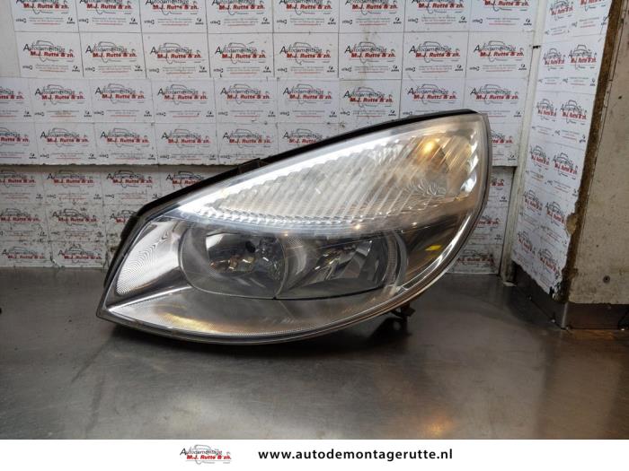 Headlight, left from a Renault Scénic II (JM) 1.6 16V 2004