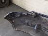 Front bumper from a Volkswagen Polo IV (9N1/2/3) 1.4 16V 2005