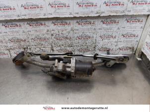 Used Wiper motor + mechanism Renault Clio III (BR/CR) 1.4 16V Price on request offered by Autodemontage M.J. Rutte B.V.