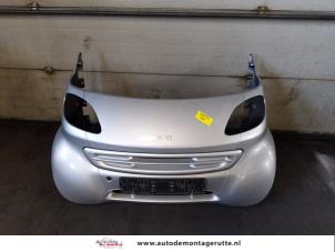 Used Front bumper Smart City-Coupé 0.6 Turbo i.c. Smart&Pulse Price on request offered by Autodemontage M.J. Rutte B.V.