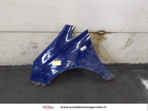 Used Front wing, left Opel Corsa D 1.3 CDTi 16V ecoFLEX Price on request offered by Autodemontage M.J. Rutte B.V.