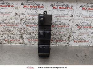 Used Multi-functional window switch Nissan Note (E11) 1.4 16V Price on request offered by Autodemontage M.J. Rutte B.V.
