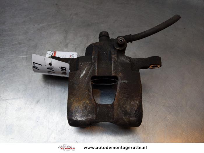 Front brake calliper, left from a Chevrolet Matiz (M200) 0.8 S,SE 2005