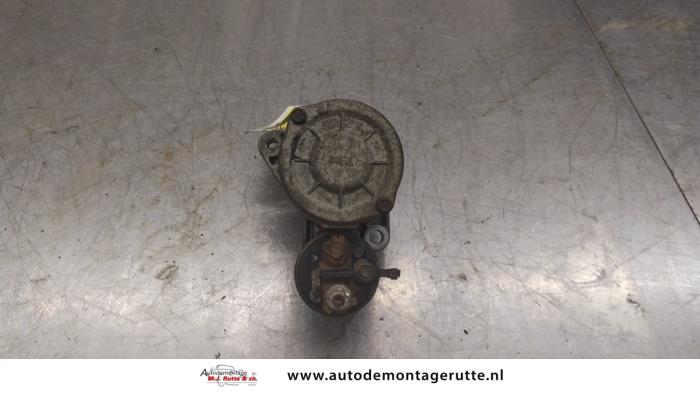 Starter from a Nissan Micra (K11) 1.4 16V 2002
