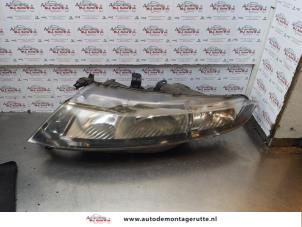 Used Headlight, left Honda Civic (FK/FN) 1.4 i-Dsi Price € 75,00 Margin scheme offered by Autodemontage M.J. Rutte B.V.