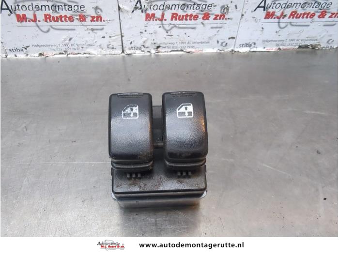 Usados Interruptor combinado de ventanillas Chevrolet Kalos (SF48) 1.4 16V Precio de solicitud ofrecido por Autodemontage M.J. Rutte B.V.