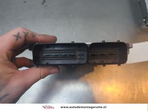 Engine management computer from a Volkswagen Touran (1T1/T2) 1.6 FSI 16V 2003