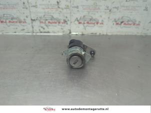 Ignition lock + computer from a Opel Combo 1.3 CDTI 16V ecoFlex 2014