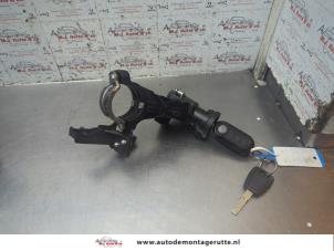 Ignition lock + computer from a Opel Combo 1.3 CDTI 16V ecoFlex 2014