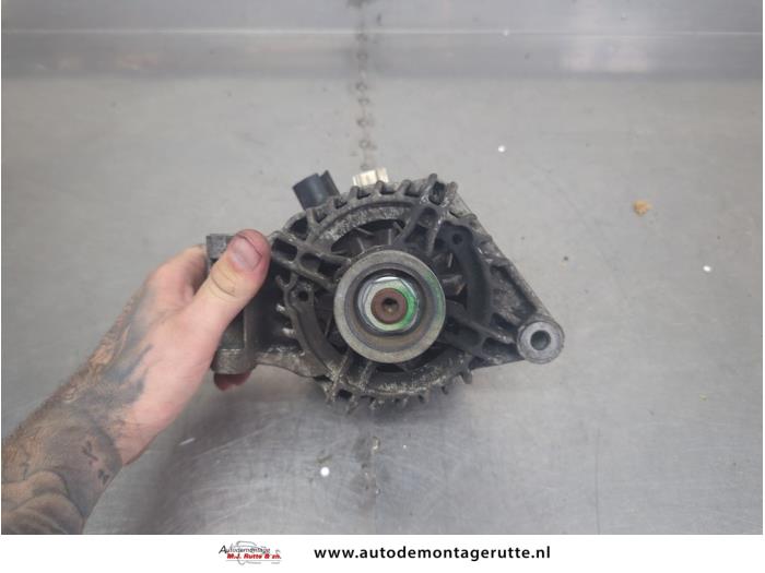 Begagnade Dynamo Ford Focus 2 Wagon 1.6 16V Pris på förfrågan erbjuds av Autodemontage M.J. Rutte B.V.