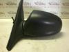 Wing mirror, left from a Hyundai Accent 1.5i 12V 2000