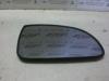 Mirror glass, right from a Hyundai Accent 1.5i 12V 2000