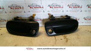 Used Front door handle 4-door, right Hyundai Accent 1.3 12V Price on request offered by Autodemontage M.J. Rutte B.V.