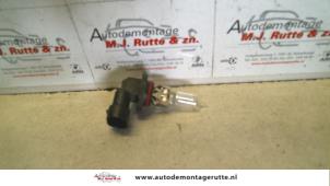 Used Headlight socket Opel Astra Price on request offered by Autodemontage M.J. Rutte B.V.