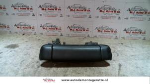Used Front door handle 4-door, right Mazda Demio (DW) 1.5 16V Price on request offered by Autodemontage M.J. Rutte B.V.