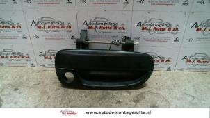 Used Front door handle 4-door, right Hyundai Accent 1.3i 12V Price on request offered by Autodemontage M.J. Rutte B.V.