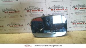 Used Mirror glass, left Renault Laguna II Grandtour (KG) 1.8 16V Price on request offered by Autodemontage M.J. Rutte B.V.