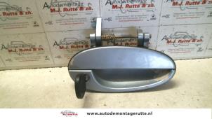 Used Front door handle 4-door, right Chevrolet Tacuma 1.6 16V Price on request offered by Autodemontage M.J. Rutte B.V.