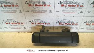Used Front door handle 4-door, right Mazda Demio (DW) 1.3 16V Price on request offered by Autodemontage M.J. Rutte B.V.