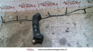 Used Steering wheel mounted radio control BMW 5 serie Touring (E39) 528i 24V Price on request offered by Autodemontage M.J. Rutte B.V.
