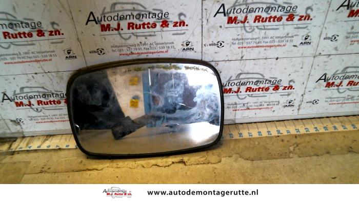 Spiegelglas rechts van een Ford Escort 6 (AAL/ABL) 1.6 16V 1998