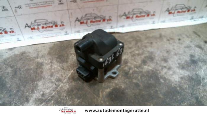 Ignition coil from a Volkswagen Polo III (6N1) 1.4i 60 1999