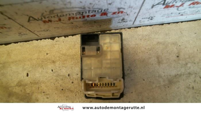 Interruptor de retrovisor de un Daihatsu Cuore (L251/271/276) 1.0 12V DVVT 2004