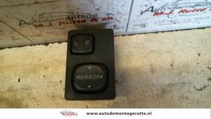 Used Mirror switch Daihatsu Cuore (L251/271/276) 1.0 12V DVVT Price on request offered by Autodemontage M.J. Rutte B.V.