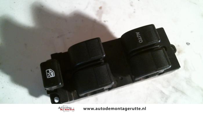 Używane Przelacznik combi okienny Mazda 626 (GW19) 1.8i 16V Cena na żądanie oferowane przez Autodemontage M.J. Rutte B.V.